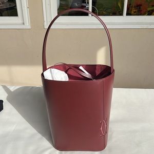 Authentic Cartier Bordeaux Leather Must C Bucket Bag. New with tags